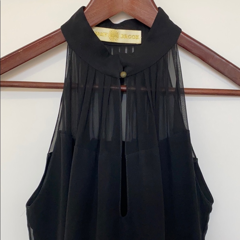 A black silk blouse by Ramy Brook